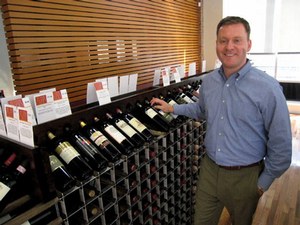 Displaying Wine Bottles In A Tilted Position Creates A Personal Wine Buying Experience