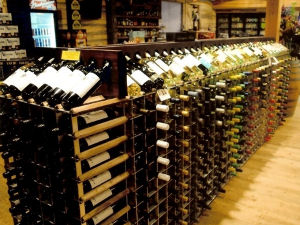 End Cap Wine Racks Help Sell More Wine in Commercial Wine Rack Buyers Guide photo gallery from Commercial Wine Racks for Retail Stores